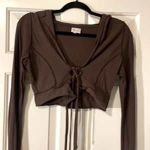 Brown Dervish designer cropped hoodie with lace up front closure.
